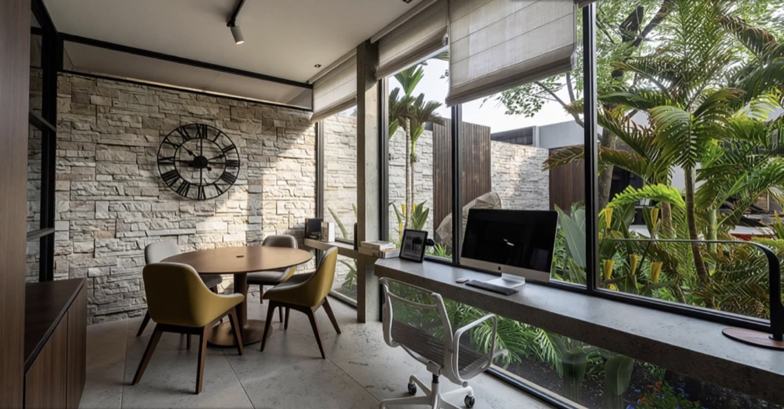 Home office with stone feature wall and garden views